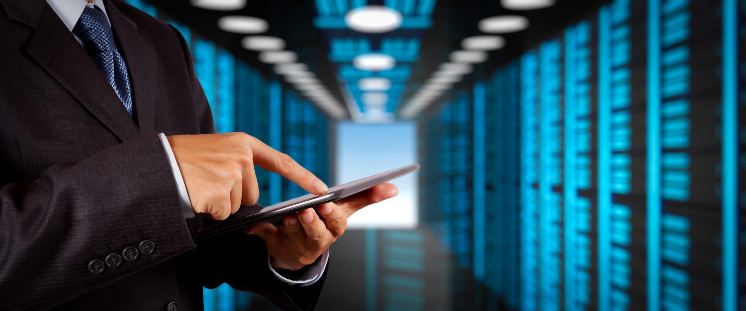 Businessman working with VR wide blank screen computer on server